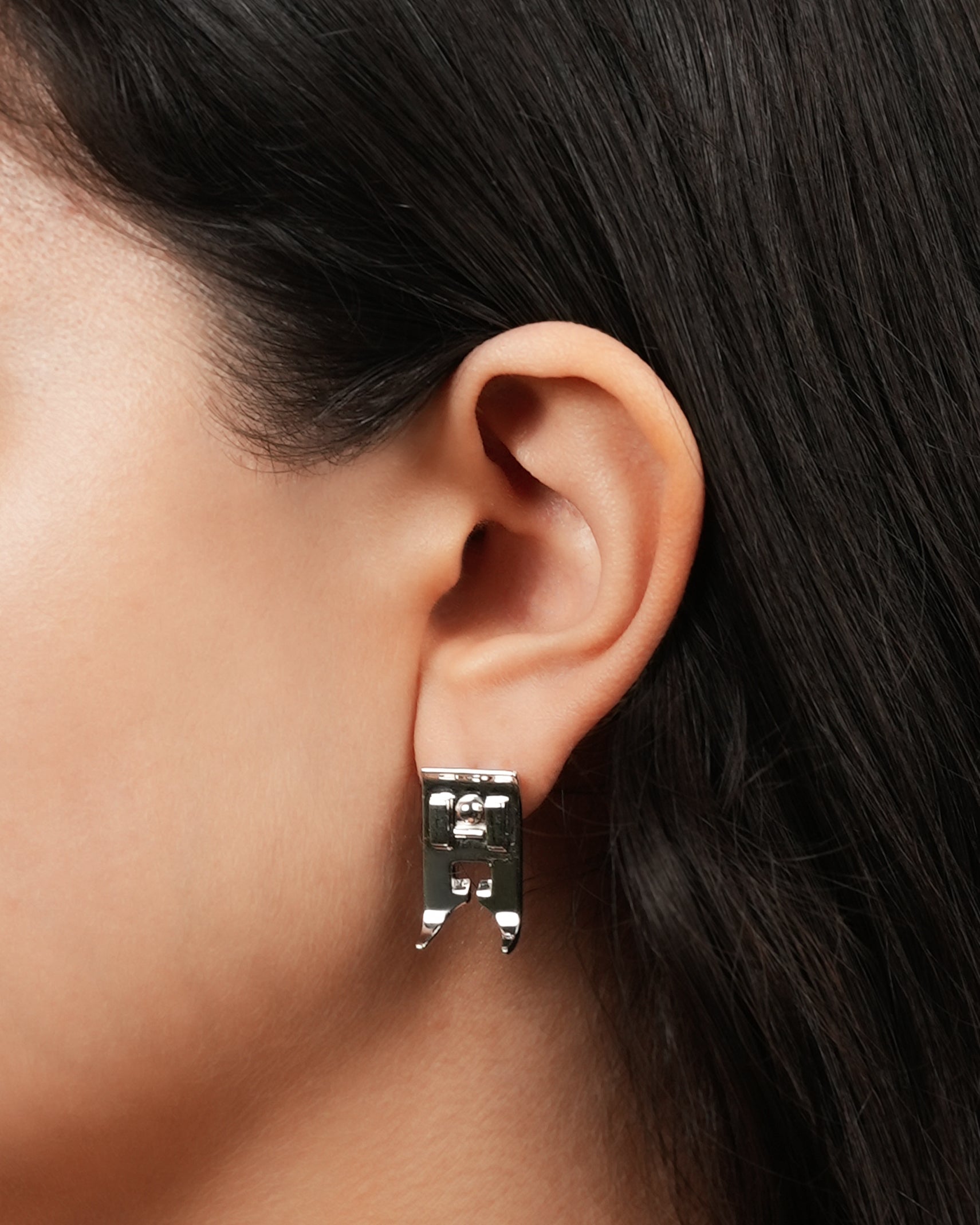 The Persser Foot necklace-earring