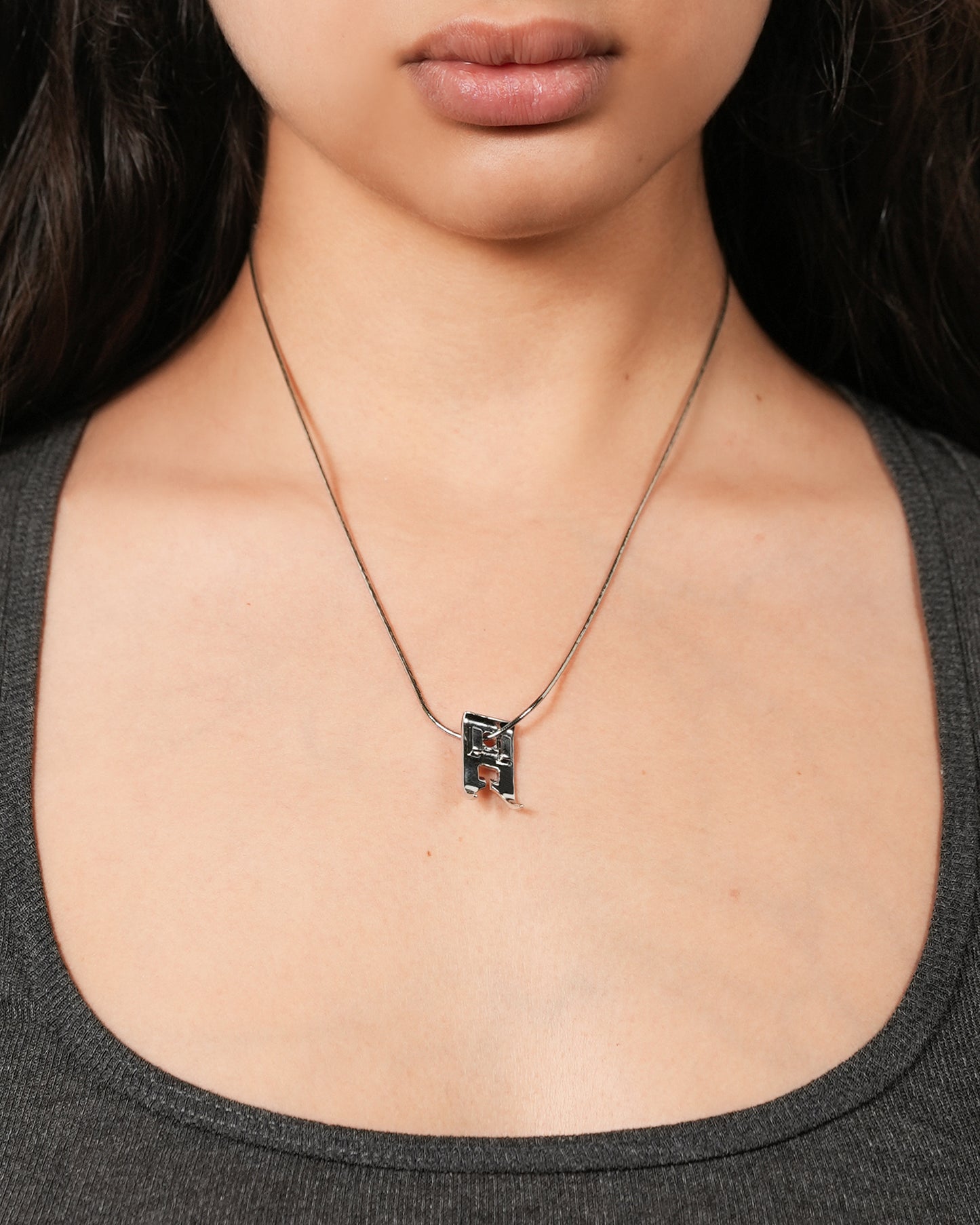 The Persser Foot necklace-earring